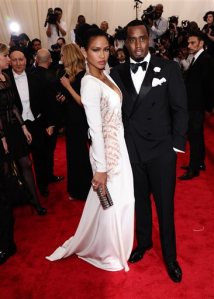 FILE - In this May 4, 2015 file photo, Cassie, left, and Sean "Diddy" Combs arrive at The Metropolitan Museum of Art's Costume Institute benefit gala celebrating "China: Through the Looking Glass" in New York. Forbes recently named him the wealthiest hip-hop artist, and his fragrances, his latest being 3AM, have earned him a couple of FiFi Awards. (Photo by Charles Sykes/Invision/AP, FIle)