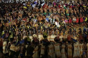 Indians from various ethnic groups and countries dance during the opening ceremony of the World Indigenous Games, in Palmas, Brazil, Friday, Oct. 23, 2015. Billed as the indigenous Olympics, the games are expected to attract athletes from dozens of Brazilian ethnicities, as well as from such nations as Ethiopia and New Zealand. (AP Photo/Eraldo Peres)