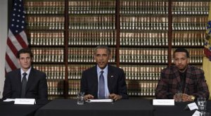 President Barack Obama, flanked by David Forem, left, President of Forem Facility Management who works firsthand on re-entry and rehabilitation with formerly incarcerated individuals and Dquan Rosario, a ReNew program participant, who was formerly incarcerated, participates in a discussion at Newark Rutgers University Center for Law and Justice in Newark, N.J., Monday, Nov. 2, 2015. Obama is calling for breaking the cycle of incarceration by helping former inmates successfully re-enter society.   (AP Photo/Susan Walsh)