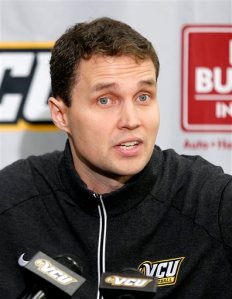 In this Oct. 26, 2015, photo, VCU NCAA college basketball head coach Will Wade speaks during media day at the Siegel Center in Richmond Va.  VCU surged at the end of last season, winning the Atlantic 10 tournament to earn its fifth consecutive trip to the NCAA tournament. (Mark Gormus/Richmond Times-Dispatch via AP) MANDATORY CREDIT (