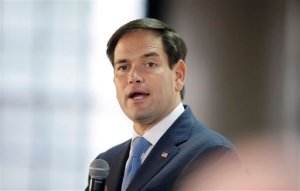 In this photo taken Oct. 19, 2015, Republican presidential candidate Sen. Marco Rubio speaks in Salt Lake City. One of Floridas largest newspapers is calling on Rubio to resign from the Senate for not doing his job. The South Florida Sun-Sentinel says in an editorial Rubio should step down and let Floridians elect someone who wants to be there and earn an honest dollar for an honest day's work. (AP Photo/Rick Bowmer)