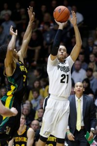 Purdue guard Kendall Stephens (21) shoots over Vermont guard Trae Bell-Haynes (2) in the first half of an NCAA college basketball game in West Lafayette, Ind., Sunday, Nov. 15, 2015.  (AP Photo/Michael Conroy)