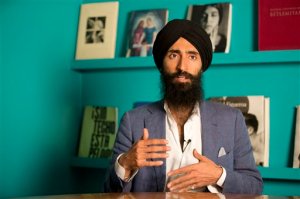 Waris Ahluwalia, a member of the Sikh community, gives an interview in Mexico City, Tuesday, Feb. 9, 2016. The Indian-American actor and designer who wasn't allowed to board a Mexico City-to-New York flight after refusing to remove his turban said Tuesday that he is satisfied with an apology from the airline.  Ahluwalia said he is now waiting for Aeromexico to implement special training on how to treat Sikh passengers, for whom the headgear carries deep religious significance. (AP Photo/Eduardo Verdugo)