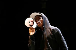In this Tuesday, May 10, 2016, photo, actor Amir Randall, playing Trayvon Martin, acts out a scene during a rehearsal for The Ballad of Trayvon Martin at the New Freedom Theatre in Philadelphia. The play, about the death of 17-year-old Trayvon Martin, opens Thursday. (AP Photo/Matt Slocum)