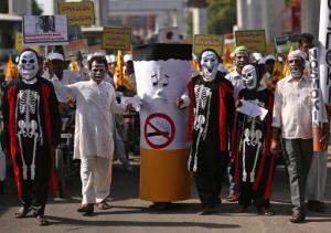 Indians dressed as skeletons and cigarette in a rally to mark World No Tobacco Day in in Hyderabad, India, Tuesday, May 31, 2016. The member states of the World Health Organization observe May 31 every year as World No Tobacco Day to draw global attention to the tobacco epidemic and to the preventable death and disease it causes. (AP Photo /Mahesh Kumar A.)