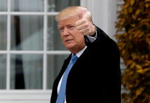 President-elect Donald Trump gives the thumbs up as he arrives at the Trump National Golf Club Bedminster clubhouse, Sunday, Nov. 20, 2016 in Bedminster, N.J.. (AP Photo/Carolyn Kaster)