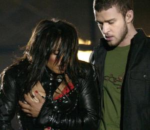 FILE - In this Sunday Feb. 1, 2004, file photo, entertainer Janet Jackson, left, covers her breast after her outfit came undone during the half time performance with Justin Timberlake at Super Bowl XXXVIII in Houston. Jackson's wardrobe malfunction is the indelible memory of the last Super Bowl in Houston, overshadowing a thrilling win by the New England Patriots in 2004 and forever changing how the NFL handles halftime performances. (AP Photo/David Phillip, File)